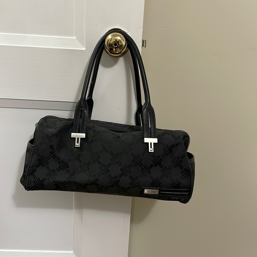 Black Tumi Barrel Bag